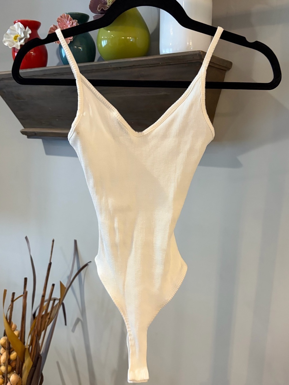 Lulu's white small Ribbed V-Neck Bodysuit